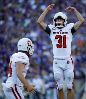 South Dakota place kicker Mason Lorber (31) celebrates after making a field goal during the first half of an NCAA college football game against Kansas State Saturday, Sept. 1, 2018, in Manhattan, Kan. (AP Photo/Charlie Riedel)
