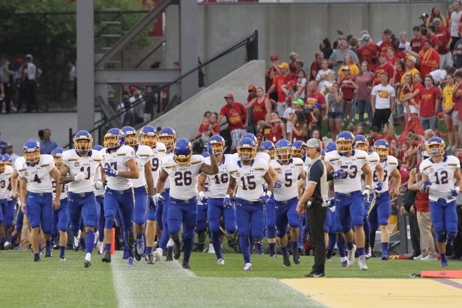 SDSU Runs onto the field before the Jacks’ matchup against Iowa State Saturday afternoon at Jack Trice Stadium in Ames, IA. Jason Salzman For The Argus Leader