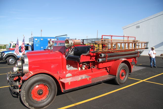 A 1928 fire engine belonging to the Carlsbad Police Department shows up to Monday's Labor Day parade. It was cancelled due