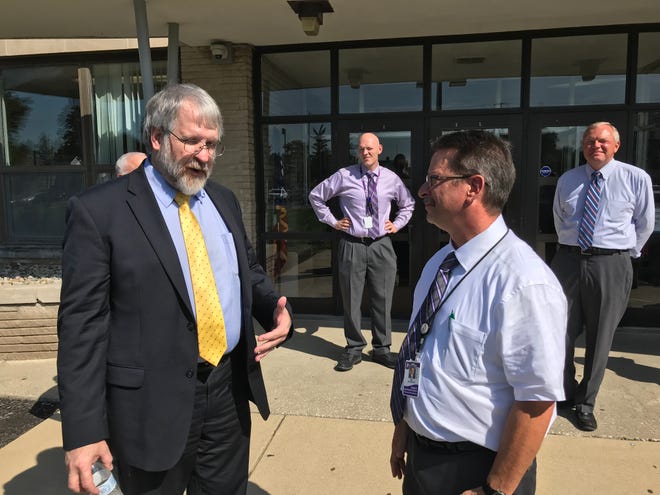 Ohio Department of Education Superintendent Paolo DeMaria meets with Fremont City Schools Superintendent Jon Detwiler Tuesday after touring Ross High School.