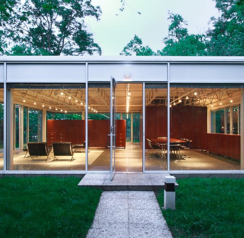 This custom-designed glass house, built by a...