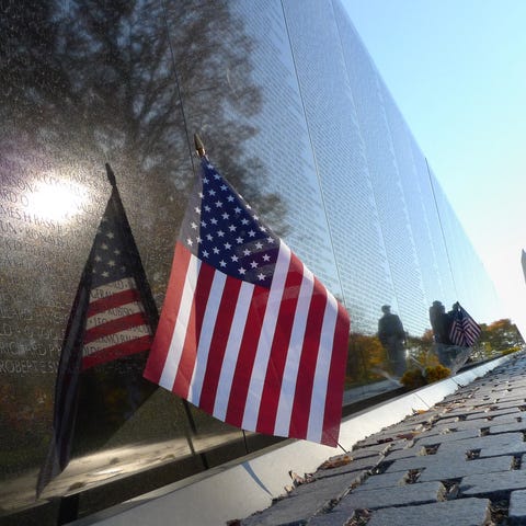 A U.S. flag is seen next to the Vietnam War Memori