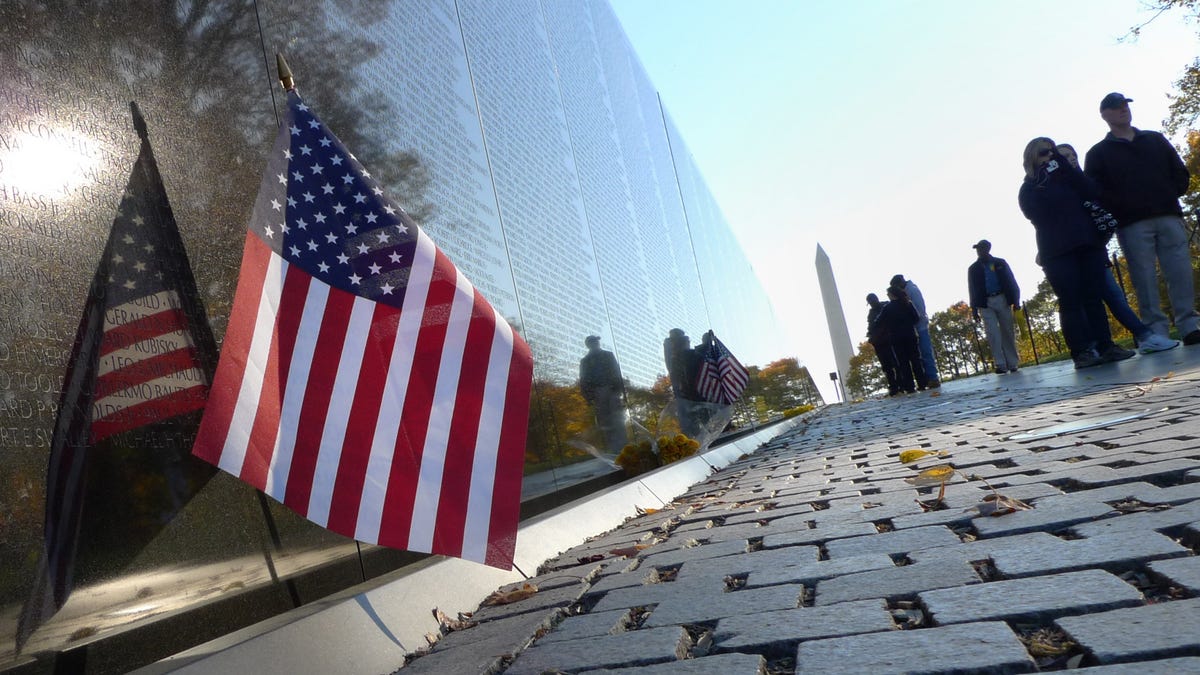A U.S. flag is seen next to the Vietnam War Memorial.