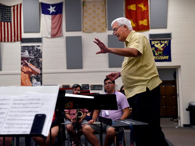Billy Harden, assistant professor of music and director of bands, leads a concert band rehearsal Wednesday at Hardin-Simmons University.