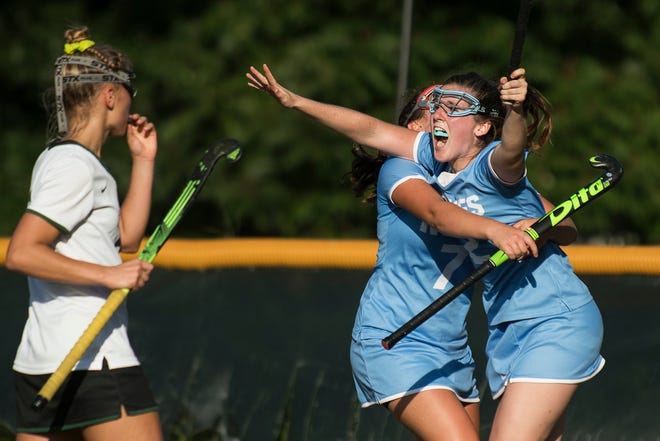 South Burlington's Kate Hall (2) celebrates an overtime goal during the girls field hockey game between the South Burlington Wolves and the Rice Green Knights at Rice Memorial High School on Tuesday afternoon September 4, 2018 in South Burlington.