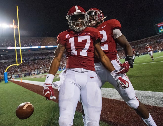 Alabama wide receiver Jaylen Waddle (17) celebrates a touchdown that is called back because of an Alabama penalty against Louisville in second half action of the Camping World Kickoff at Camping World Stadium in Orlando, Fla., on Saturday September 1, 2018.