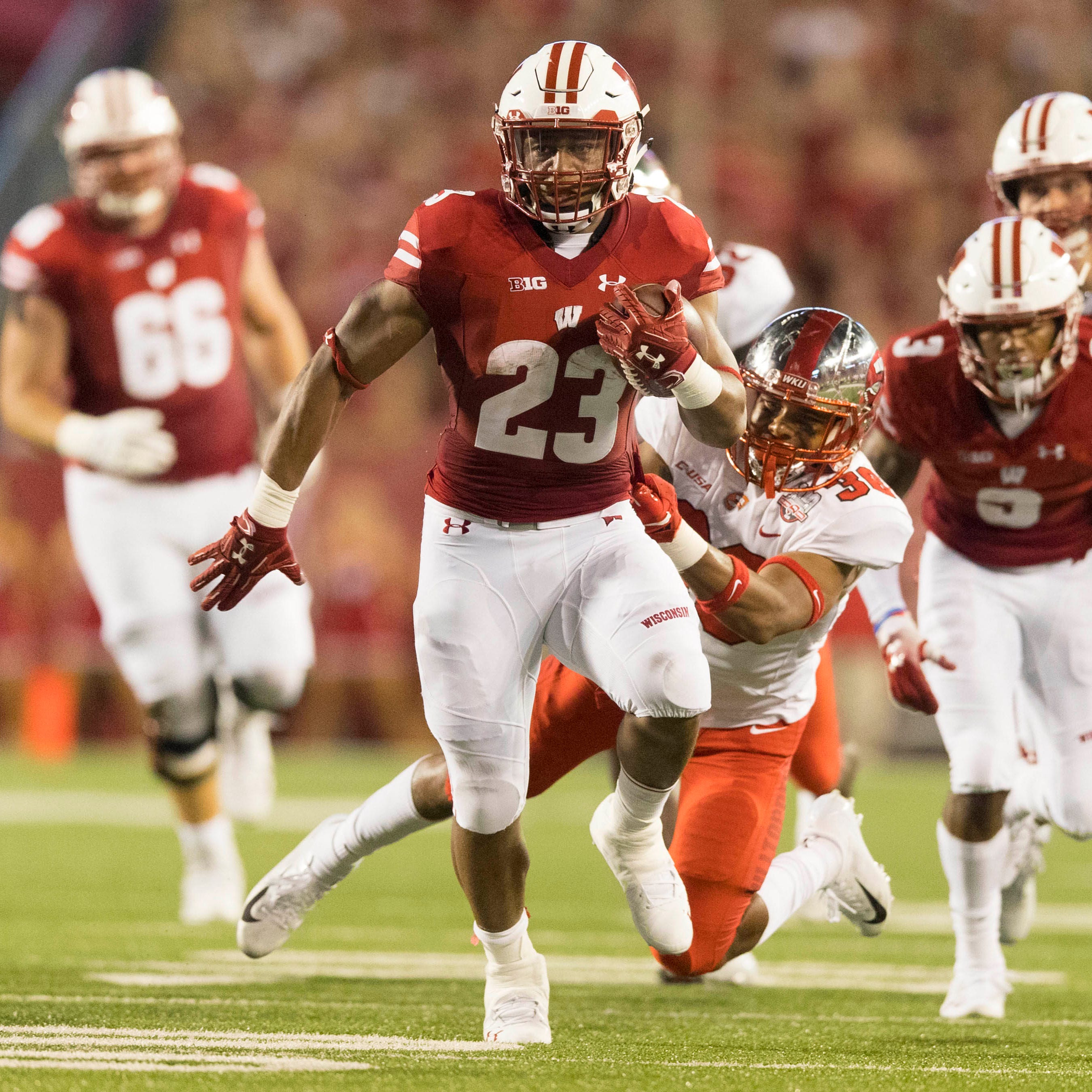 Wisconsin running back Jonathan Taylor breaks free for a touchdown against Western Kentucky in the team's opener.