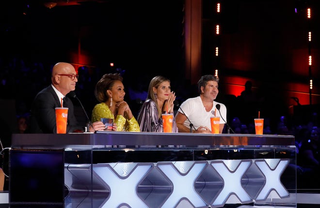 'America's Got Talent' judges Howie Mandel, Mel B, Heidi Klum and Simon Cowell take in Tuesday's semifinal performances at Hollywood's Dolby Theatre.
