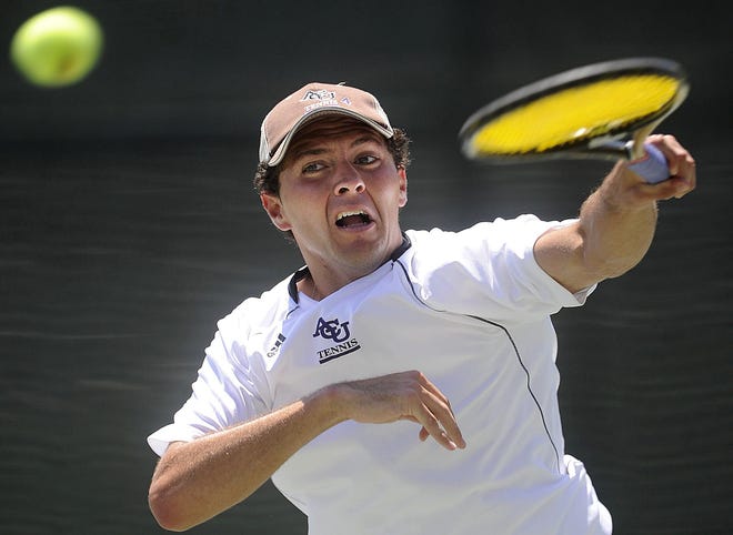 Abilene Christian's Hans Hach returns a serve during the doubles match against Northwest Missouri State University during the NCAA Division II South Central Region Tournament at ACU in 2012.