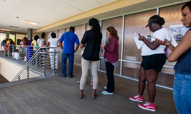 Alabama State University students stand in line to deal with financial aid on the ASU campus in Montgomery, Ala., on Tuesday August 28, 2018.