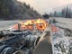 A couple trucks that burned up in the Delta Fire remained burning Wednesday evening, Sept. 5, 2018 on Interstate 5 north of Redding.