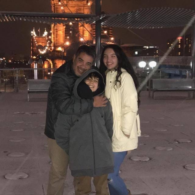 Luis Felipe Calderón with his two children, Andres and Natalia. Calderón was one of the three people killed by a shooter in a rampage in Fountain Square on Sept. 6.