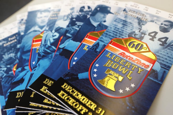 The tickets for the 60th AutoZone Liberty Bowl game feature photos of 12 coaches and players that made headlines in the game.