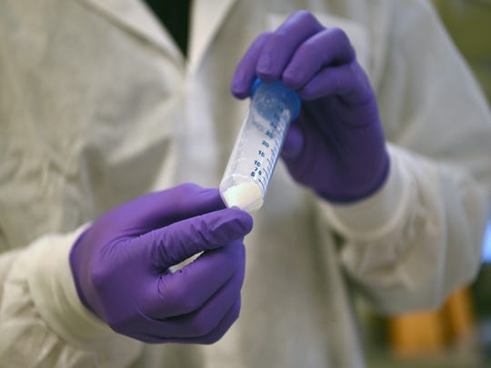 Yasser Hernandez, a forensic scientist with the New York City Office of Chief Medical Examiner, discusses the bone grinding process used to help identify remains of deceased victims. The unit handles DNA testing for unidentified persons, including victims of the attacks on the World Trade Center on 9/11. 