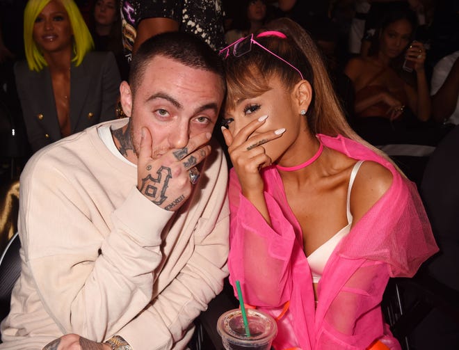 Mac Miller and singer Ariana Grande pose backstage during the 2016 MTV Video Music Awards at Madison Square Garden on Aug. 28, 2016.