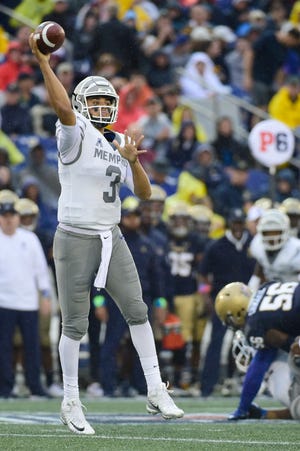 Memphis Tigers quarterback Brady White (3) throws during the first quarter against the Navy Midshipmen at Navy-Marine Corps Memorial Stadium.