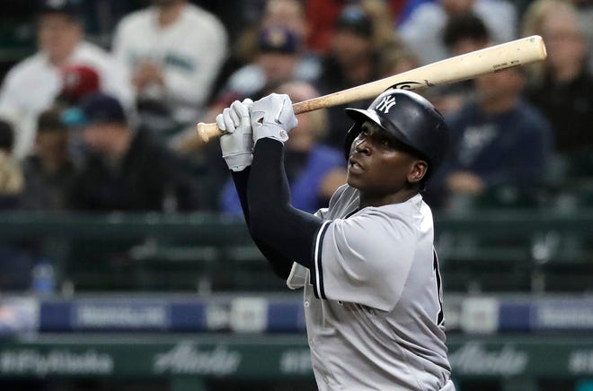 New York Yankees' Didi Gregorius takes a swing during an at-bat in the ninth inning of a baseball game against the Seattle Mariners, Friday, Sept. 7, 2018, in Seattle. Gregorius grounded out on the at-bat. The Yankees won 4-0.