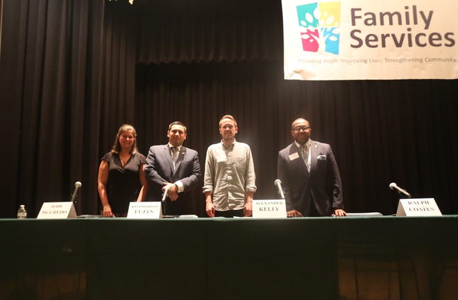(from left to right) State Assembly candidates Jodi McCredo, Kevindaryán Luján, Alexander Kelly and Ralph Coates stand together following a forum in the City of Poughkeepsie on Thursday night. Jonathan Jacobson was unable to attend as he was at a Newburgh city council meeting.