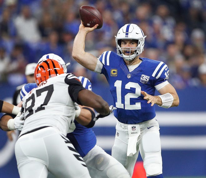 Indianapolis Colts quarterback Andrew Luck (12) pass on the Cincinnati Bengals defense in the first half of their game against the Cincinnati Bengals at Lucas Oil Stadium on Sept. 9, 2018. 