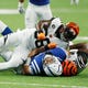 Cincinnati Bengals safety Shawn Williams (36) is ejected on this play for a late hit and helmet to helmet contact on Indianapolis Colts quarterback Andrew Luck (12) during the first quarter at Lucas Oil Stadium.