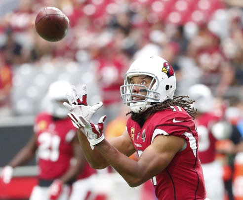 Larry Fitzgerald warms up before the Cardinals' loss to the Redskins at State Farm Stadium.