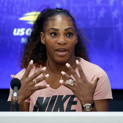 Serena Williams speaks at a press conference...