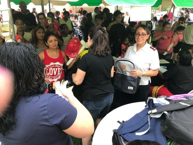 Major America Barriera of the Salvation Army-Vineland helped hand out 300 backpacks during the Salvation Army’s Back to School Bash on Sept. 1.