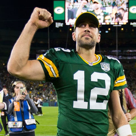 Aaron Rodgers celebrates after beating the Bears...
