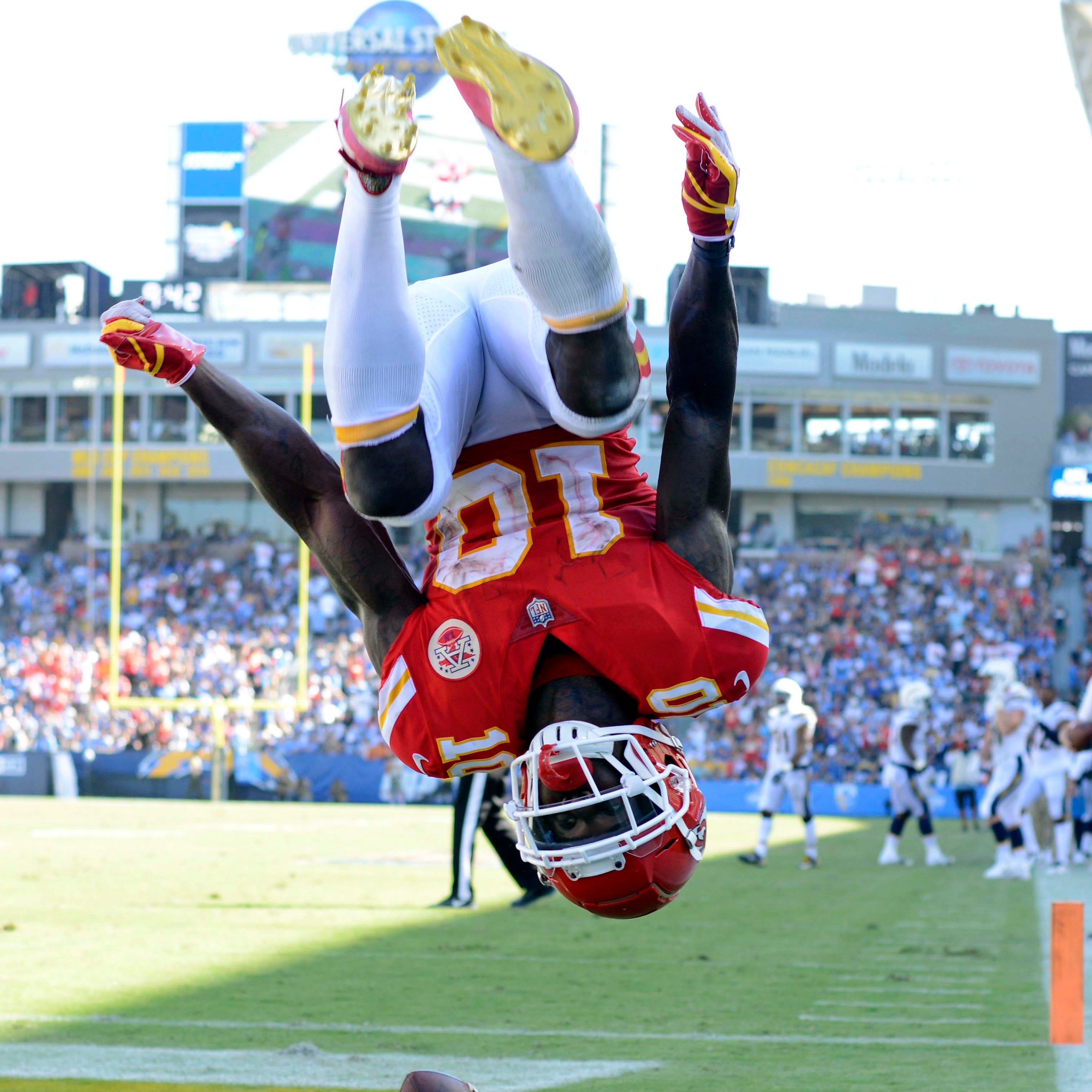 Kansas City Chiefs wide receiver Tyreek Hill (10) flips in celebration after a fourth quarter touchdown  against the Los Angeles Chargers at StubHub Center.