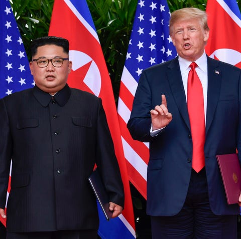 President Donald Trump and Kim Jong Un on June 12...