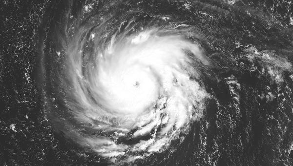 A satellite image shows Hurricane Florence...