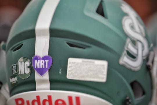 St. Joseph is wearing helmet decals this season honoring beloved former assistant coach Michael Cleary Sr. and Marisa Rose Tufaro