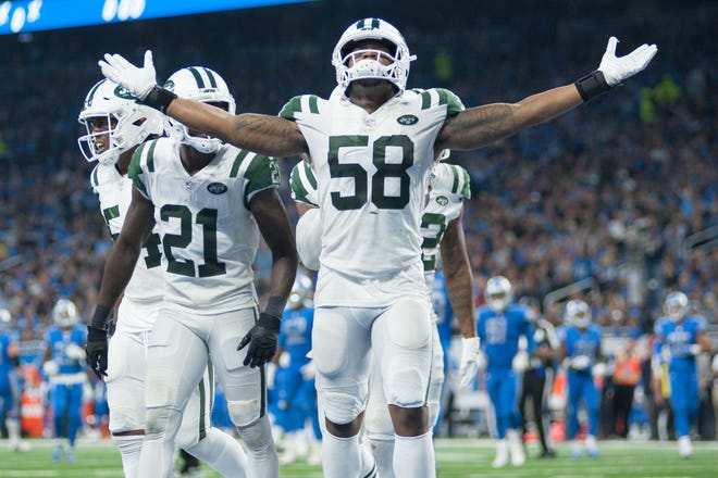 Sep 10, 2018; Detroit, MI, USA; New York Jets linebacker Darron Lee (58) celebrates his touchdown during the third quarter against the Detroit Lions at Ford Field. Mandatory Credit: Tim Fuller-USA TODAY Sports