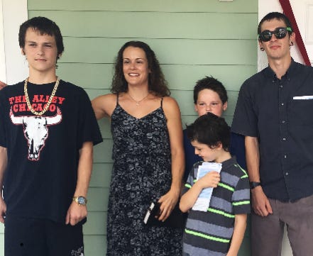 Melissa Arduini and her four sons moved into a new home in Vero Beach, thanks to the South Florida PGA Foundation and the Indian River Habitat for Humanity.