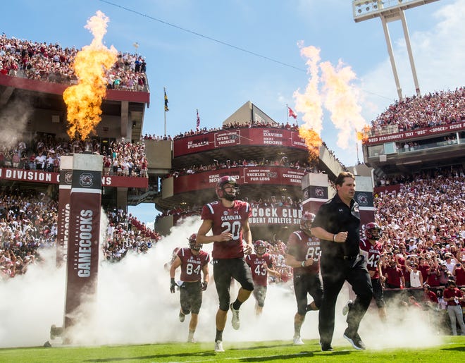 Sep 8, 2018; Columbia, SC, USA; South Carolina Gamecocks players led by South Carolina Gamecocks head coach Will Muschamp make their on-field entrance before their game against the Georgia Bulldogs at Williams-Brice Stadium. Mandatory Credit: Jeff Blake-USA TODAY Sports