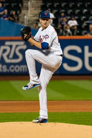 Sep 11, 2018; New York City, NY, USA; New York Mets pitcher Jacob deGrom (48) delivers a pitch during the first inning of the game against the Miami Marlins at Citi Field.