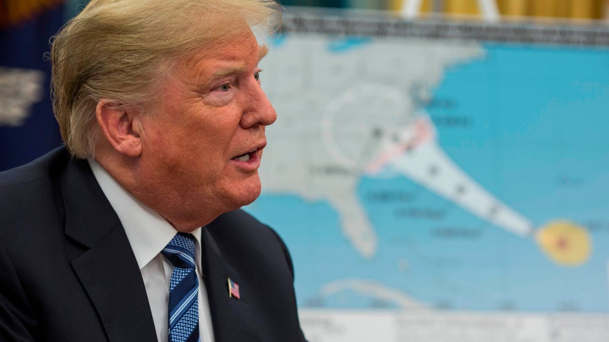President Donald Trump speaks to reporters about Hurricane Florence.