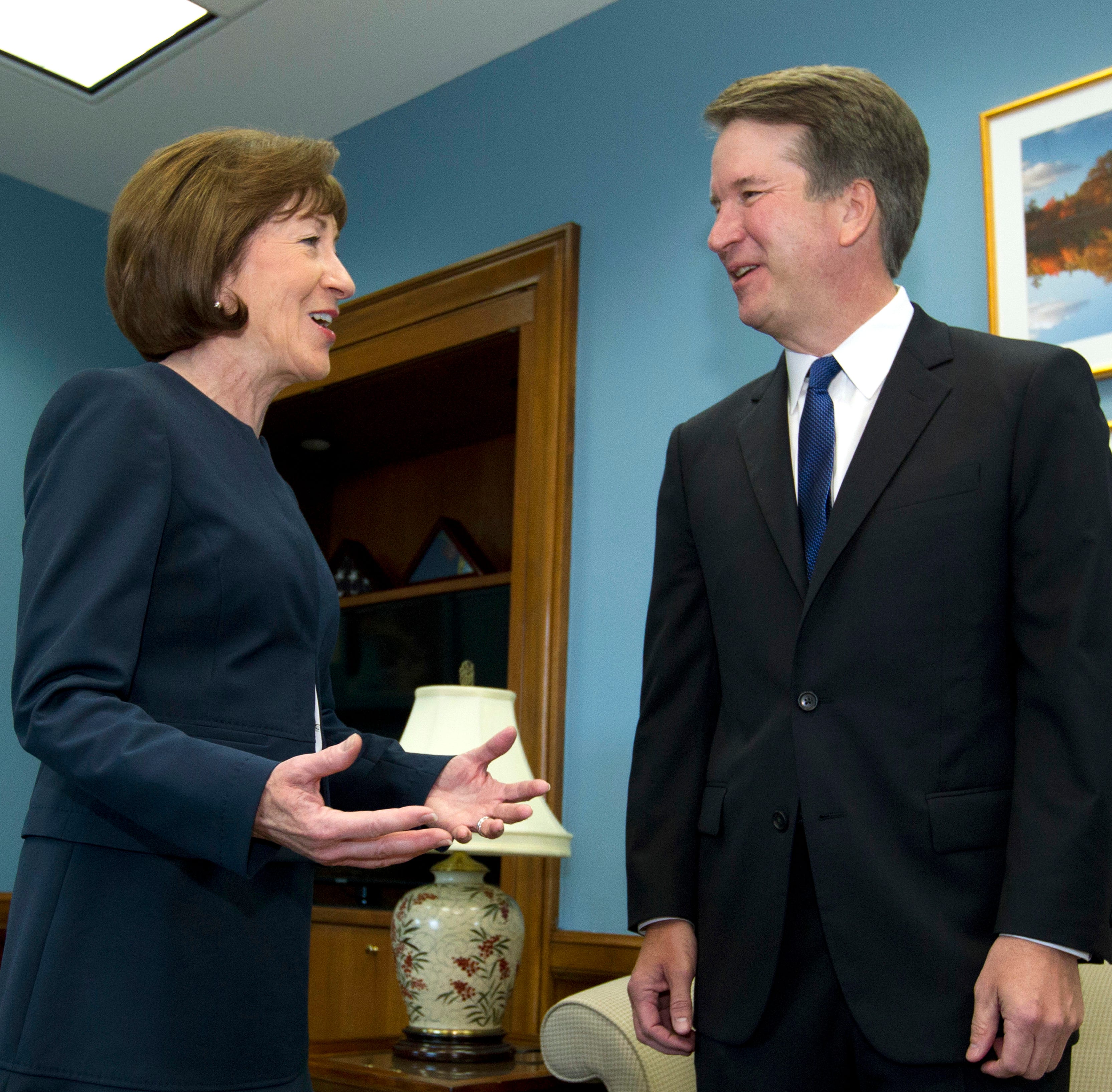 In this Tuesday, Aug. 21, 2018, file photo, Sen. Susan Collins, R-Maine, speaks with Supreme Court nominee Judge Brett Kavanaugh at her office, before a private meeting on Capitol Hill in Washington. Collins has been targeted by Democrats hoping that