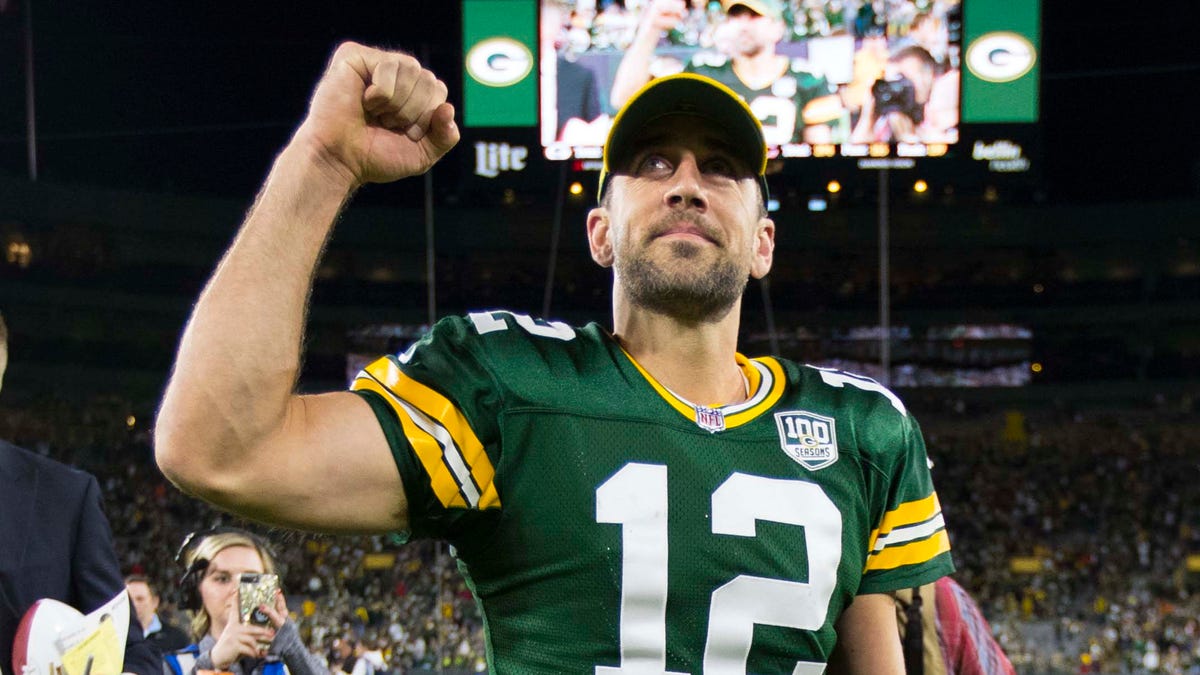 Green Bay Packers quarterback Aaron Rodgers (12) celebrates following the game against the Chicago Bears at Lambeau Field.