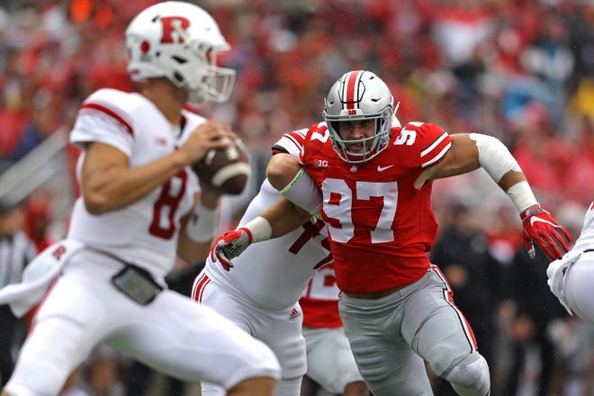 Ohio State defensive end Nick Bosa bears down on Rutgers quarterback Artu Sitkowski in the first half of last Saturday's 52-3 win. Bosa already has three sacks, five tackles for loss and two fumble recoveries, one for a TD, in the equivalent of one game.