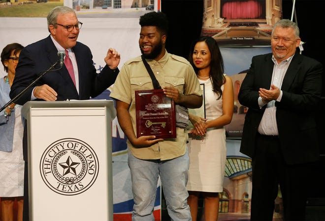 El Paso Mayor Dee Margo presents the Key to the City to El Pasoan Khalid shortly after delivering his State of the City address, which was held Thursday afternoon in the El Paso convention center. The mayor was joined by members of the City Council as he presented the award-winning music star with the honor.