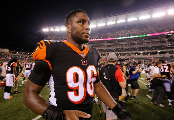 Cincinnati Bengals defensive end Carlos Dunlap (96) heads for the locker room after the fourth quarter of the NFL Week 2 game between the Cincinnati Bengals and the Baltimore Ravens at Paul Brown Stadium in downtown Cincinnati on Thursday, Sept. 13, 2018. The Bengals improved to 2-0 on the season with a 34-23 win over the Ravens. 
