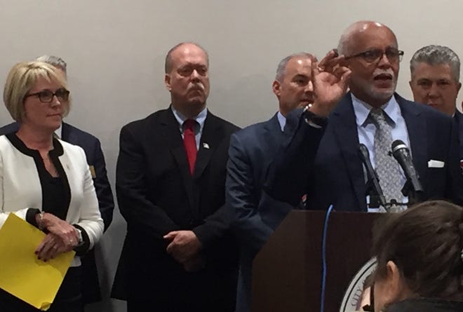 Wayne County Executive Warren Evans speaks to the media on Friday as local public and health officials announce a new initiative to battle the opiod crisis.