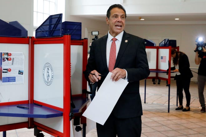 New York Gov. Andrew Cuomo speaks as he marks his primary election ballot at the Presbyterian Church of Mount Kisco, in Mount Kisco, N.Y., Thursday, Sept. 13, 2018.