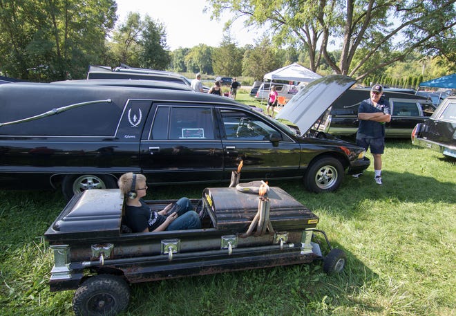 Eight-year-old David Boykin sits in his dad Kenny's go-kart Saturday, Sept. 15, 2018. About 65 hearses showed up despite the annual festival being cancelled over a disagreement with township officials.