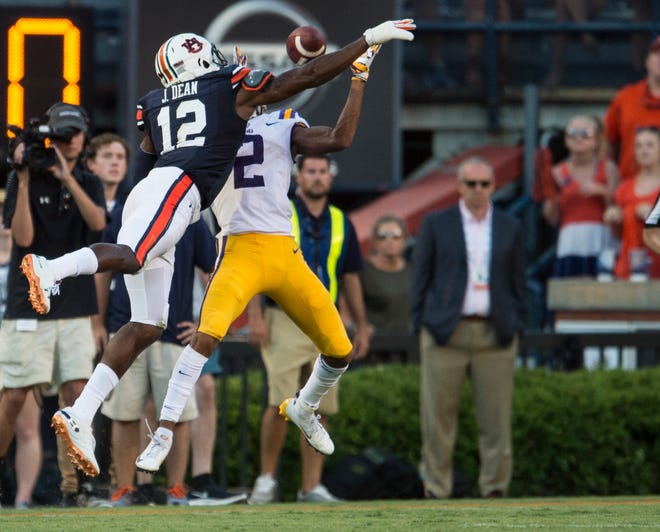 Auburn’s Jamel Dean (12) is called for pass interference on LSU’s Justin Jefferson (2) at Jordan-Hare Stadium in Auburn, Ala., on Saturday, Sept. 15, 2018. LSU defeated Auburn 22-21. The penalty set up the game winning field goal.