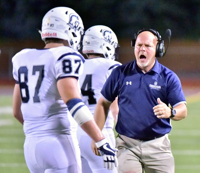 Coach Mark Luther celebrates after a Chambersburg score. Chambersburg defeated Altoona 48-28 in PIAA football to move to 4-0 on Friday, Sept. 14, 2018.