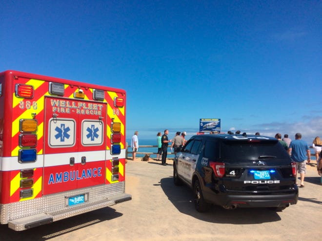 Emergency personnel respond to Newcomb Hollow Beach in Wellfleet, Mass., on Sept. 15, 2018.
