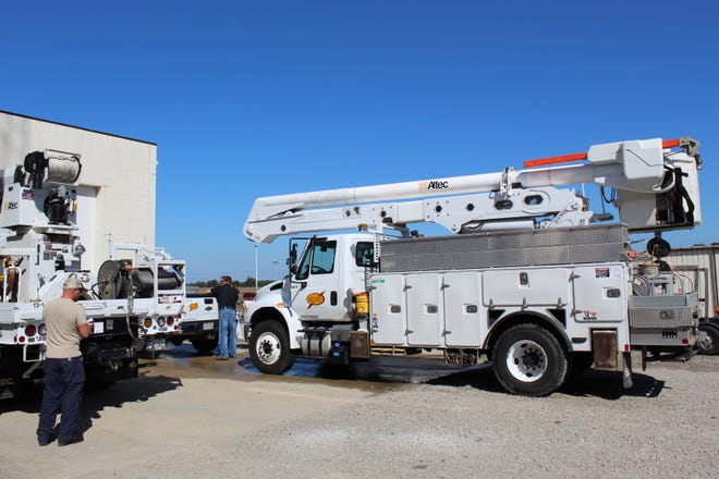Linemen from South Central Power Company in Lancaster prepare to travel to Fayetteville, North Carolina to restore power in the wake of Hurricane Florence.