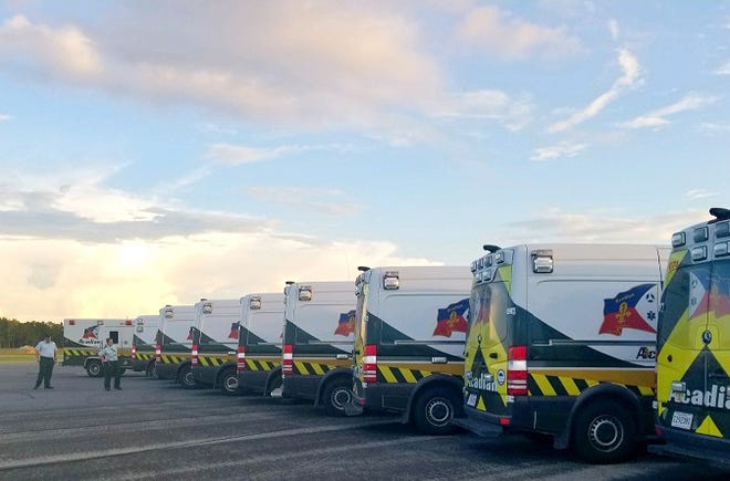 Acadian Ambulance crews and ambulances standing by for deployment.